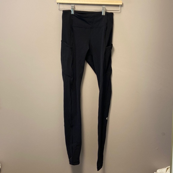 Black Lulumon Leggings with Pockets & Reflective Strip - Picture 2 of 5